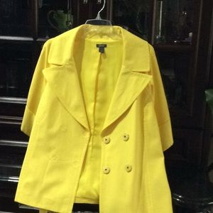 Double-breasted 3/4 sleeve. Never worn